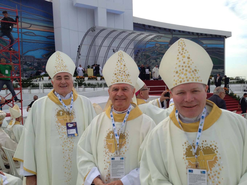 From left, Fairbanks Bishop Donald Kettler, Anchorage Archbishop Roger Schwietz and Juneau Bishop Edward Burns prepare for the Sunday Mass at World Youth Day in Rio de Janeiro, Brazil. The July 28 Mass, which was moved from its original location in western Rio de Janeiro due to heavy rains, drew an estimated 3.2 million people.